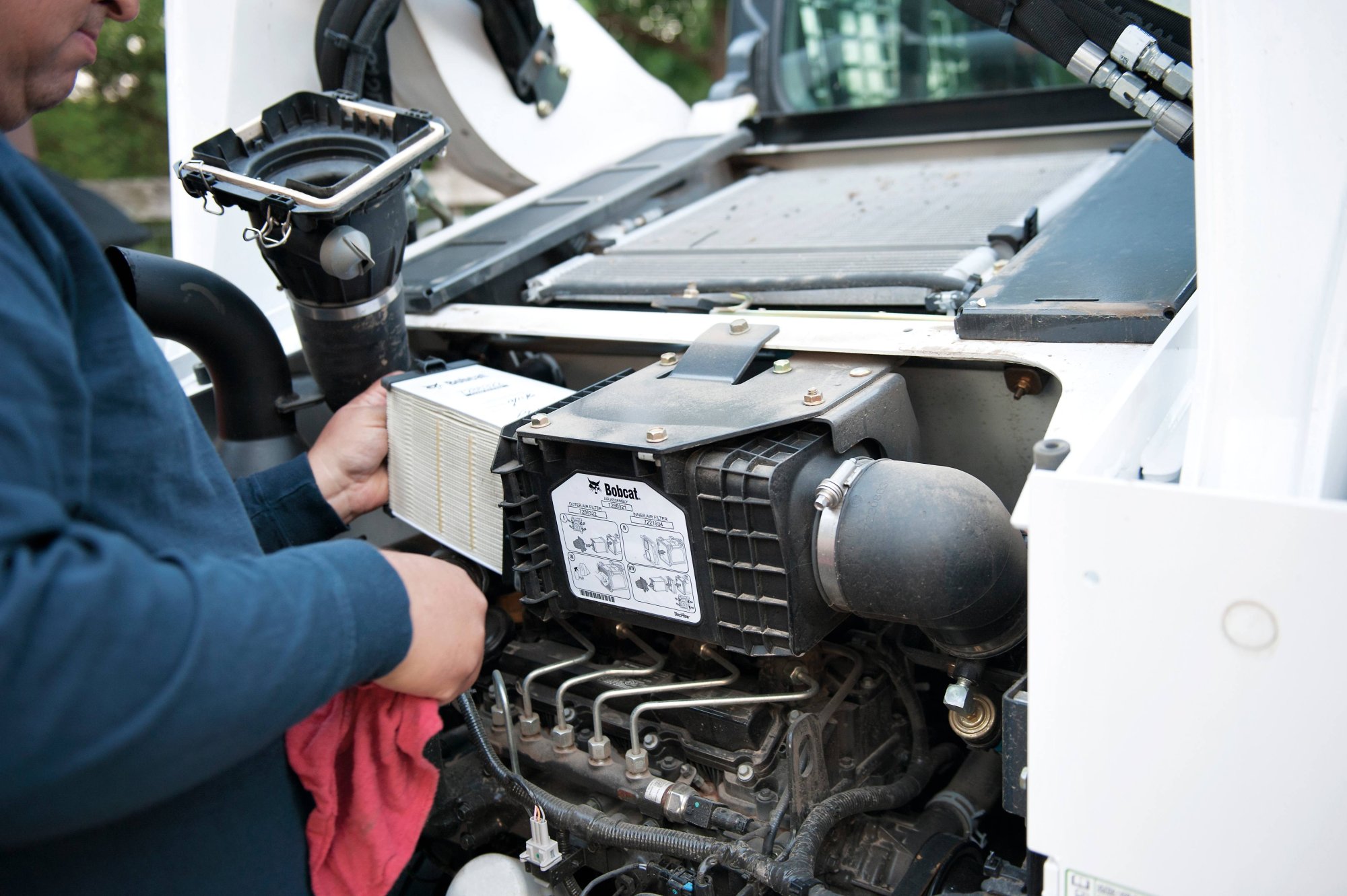 Maintenance on Bobcat machine