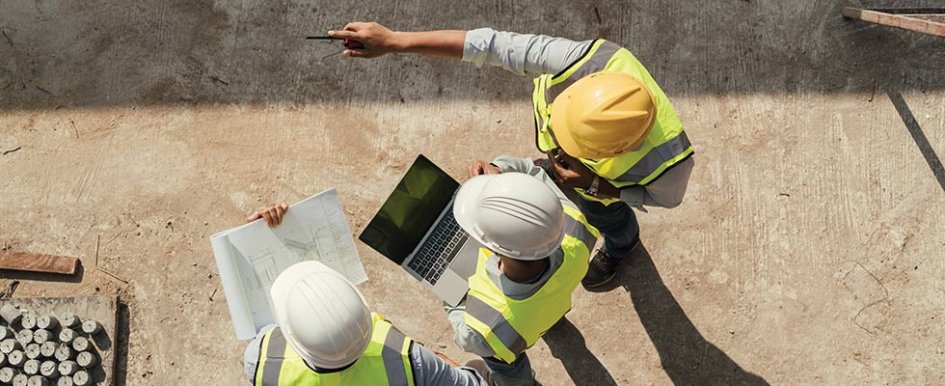 People in vests and hard hats/Adobe Stock