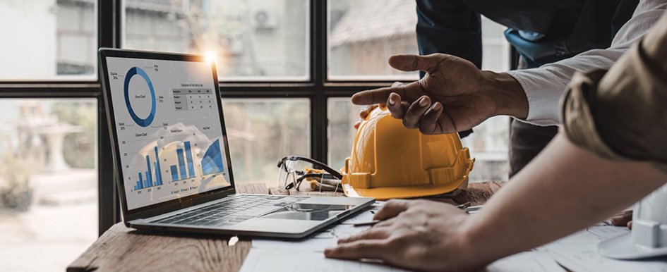 Construction workers using technology