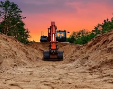 Excavator digging trench/Photo Credit: Adobe Stock