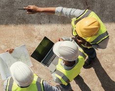 People in vests and hard hats/Adobe Stock