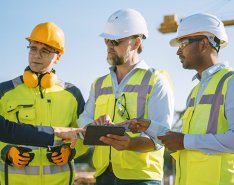 People in vests and hard hats/Adobe Stock